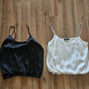 Like New Reset crop tanks. Selling as a pair.